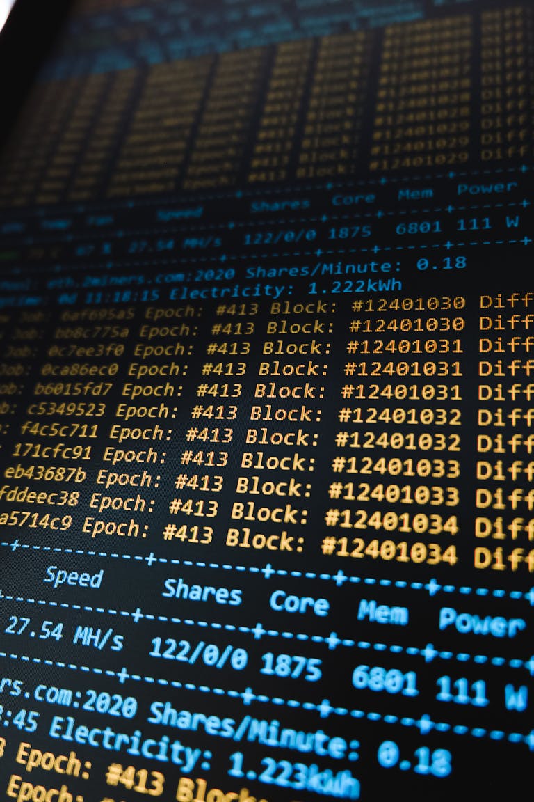 Detailed view of a cryptocurrency mining software interface displaying real-time data on a computer monitor.